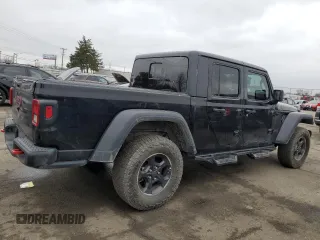 2023 Jeep Gladiator Rubicon with VIN 1C6JJTBG6PL500516, listed as a Copart auction lot 43432015 with 107,096 mi miles and Salvage title. Bid and sale history available at DreamBid. Image 3.