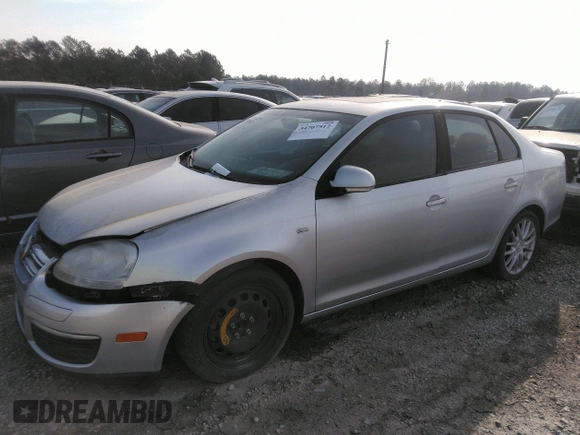 2009 Volkswagen Jetta Wolfsburg Edition with VIN 3VWRJ71K19M013277, listed as a IAAI auction lot 34707512 with 129,034 mi miles and . Bid and sale history available at DreamBid. Image 2.