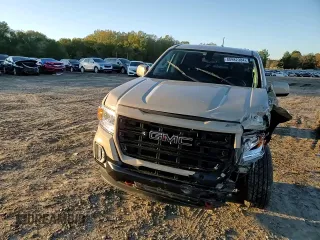 2021 GMC Canyon 4WD Elevation with VIN 1GTG6CEN1M1281552, listed as a Copart auction lot 80982384 with 50,001 mi miles and Salvage Title. Bid and sale history available at carsss.com. Image 11.