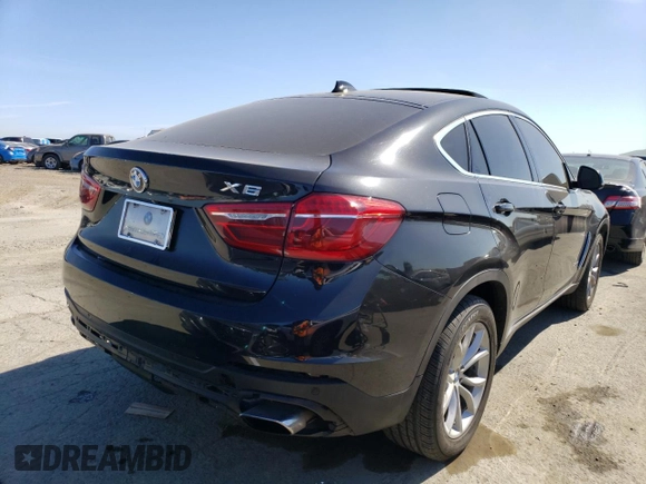 2015 BMW X6 xDrive50i with VIN 5UXKU6C53F0F94035, listed as a Copart auction lot 49604204 with 122,910 mi miles and Salvage Title. Bid and sale history available at carsss.com. Image 3.