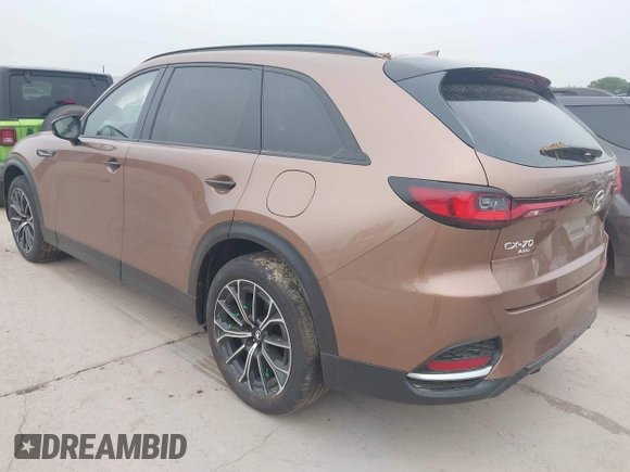 2025 Mazda CX-70 Premium Plus with VIN JM3KJEHA1S1111323, listed as a IAAI auction lot 42109316 with 561 mi miles and . Bid and sale history available at DreamBid. Image 3.
