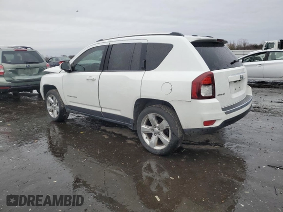 2015 Jeep Compass High Altitude Edition with VIN 1C4NJDEB2FD188994, listed as a Copart auction lot 83765504 with 124,134 mi miles and Salvage Title. Bid and sale history available at carsss.com. Image 2.