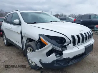 2017 Jeep Cherokee Latitude with VIN 1C4PJMCB3HW530794, listed as a IAAI auction lot 41854670 with 103,798 mi miles. Bid and sale history available at carsss.com. Image 6.