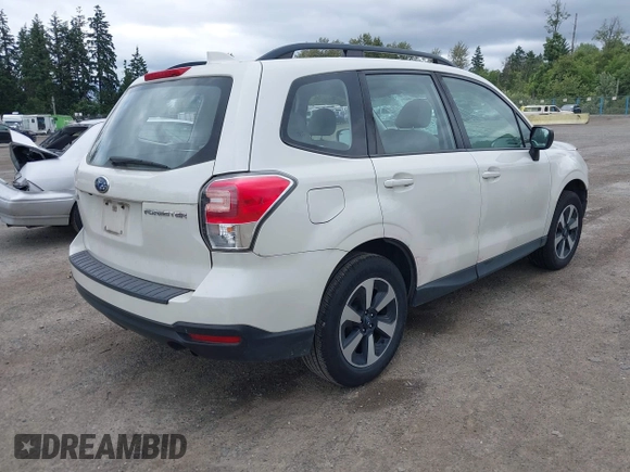 2018 Subaru Forester with VIN JF2SJABC9JH480711, listed as a IAAI auction lot 42540064 with 114,272 mi miles and . Bid and sale history available at DreamBid. Image 4.