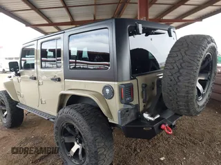 2017 Jeep Wrangler Unlimited Rubicon with VIN 1C4BJWFG7HL663203, listed as a IAAI auction lot 42391999 with 63,430 mi miles and . Bid and sale history available at DreamBid. Image 3.