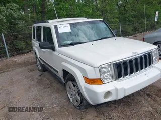 2007 Jeep Commander with VIN 1J8HG48N77C611652, listed as a IAAI auction lot 42144524 with 211,976 mi miles. Bid and sale history available at carsss.com. Image 1.
