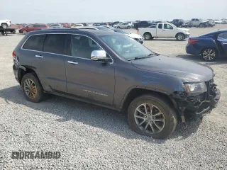 2014 Jeep Grand Cherokee Limited with VIN 1C4RJFBG5EC451741, listed as a Copart auction lot 56536195 with 172,582 mi miles and Salvage title. Bid and sale history available at DreamBid. Image 4.