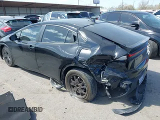 2023 Toyota Prius LE with VIN JTDACAAUXP3008201, listed as a IAAI auction lot 41824469 with 27,864 mi miles and . Bid and sale history available at carsss.com. Image 3.