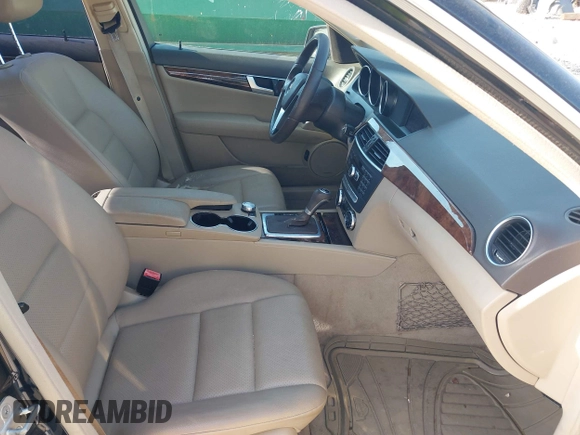 2014 Mercedes-Benz C-Class C 250 Sport with VIN WDDGF4HB3EG250671, listed as a IAAI auction lot 41607910 with 136,556 mi miles. Bid and sale history available at carsss.com. Image 5.
