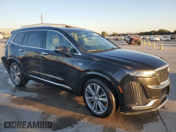 2020 Cadillac XT6 FWD Premium Luxury with VIN 1GYKPCRS2LZ183664, listed as a Copart auction lot 74754244 with 42,532 mi miles and Salvage Title. Bid and sale history available at carsss.com. Image 4.