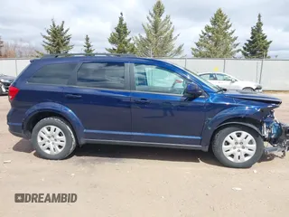 2019 Dodge Journey SE with VIN 3C4PDCBBXKT707700, listed as a IAAI auction lot 42038474 with 57,903 mi miles and . Bid and sale history available at DreamBid. Image 13.