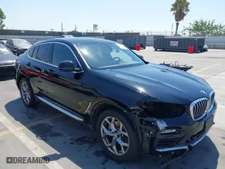 2020 BMW X4 xDrive30i with VIN 5UX2V1C06L9B62406, listed as a IAAI auction lot 40178700 with 48,947 mi miles. Bid and sale history available at carsss.com. Image 1.