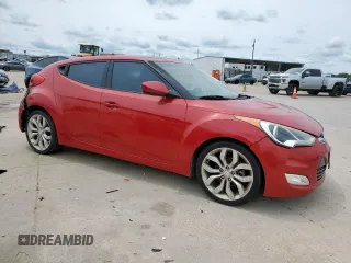 2013 Hyundai Veloster w/Gray Int z VIN KMHTC6AD7DU142655, wystawiony jako Copart lot #56233005 z przebiegiem 181 297 mil mil oraz Czysty tytuł • Clean title. Historia ofert i sprzedaży dostępna na DreamBid. Obrazek 4.