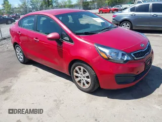 2013 Kia Rio SX with VIN KNADN4A34D6244804, listed as a IAAI auction lot 42060921 with 255,114 mi miles. Bid and sale history available at carsss.com. Image 1.