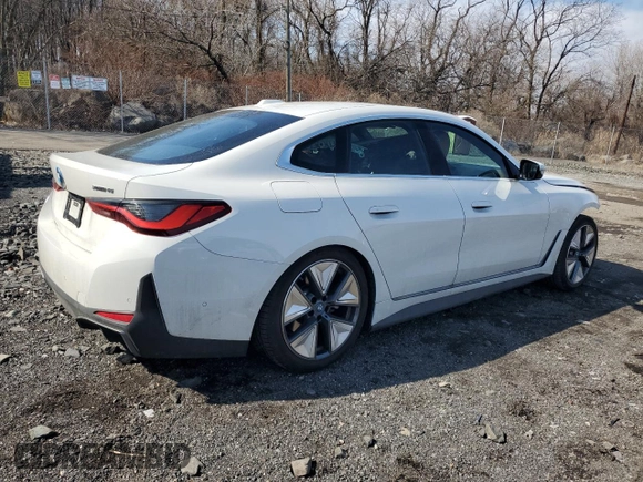2024 BMW i4 xDrive40 z VIN WBY83FB06RFS94880, wystawiony jako Copart lot #45084805 z przebiegiem 7 053 mil mil oraz Szkoda całkowita • Salvage title. Historia ofert i sprzedaży dostępna na DreamBid. Obrazek 3.
