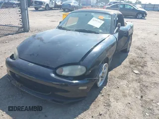 1999 Mazda MX-5 Miata with VIN JM1NB3539X0112181, listed as a IAAI auction lot 42397232 with 11 mi miles and . Bid and sale history available at DreamBid. Image 2.