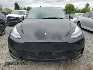 2021 Tesla Model Y Long Range with VIN 5YJYGDEE2MF243763, listed as a Copart auction lot 54941665 with 39,516 mi miles and Clean Title. Bid and sale history available at DreamBid. Image 5.