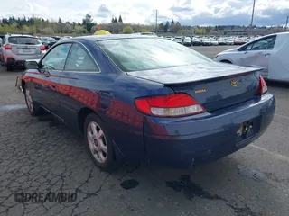 1999 Toyota Solara SE with VIN 2T1CF22P5XC163759, listed as a IAAI auction lot 41922973 with 146,042 mi miles. Bid and sale history available at carsss.com. Image 3.