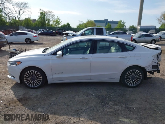 2017 Ford Fusion Hybrid Titanium с VIN 3FA6P0RU7HR148191, выставлен на аукционе IAAI как лот 42167708 с пробегом 72 708 миль миль и . История ставок и продаж доступна на DreamBid. Изображение 15.