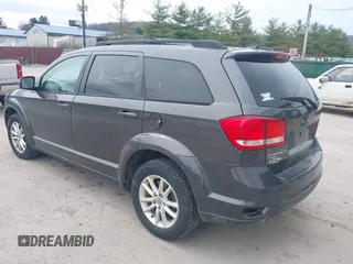 2014 Dodge Journey SXT z VIN 3C4PDDBG2ET161528, wystawiony jako IAAI lot #41932649 z przebiegiem 161 597 mil mil oraz . Historia ofert i sprzedaży dostępna na DreamBid. Obrazek 3.