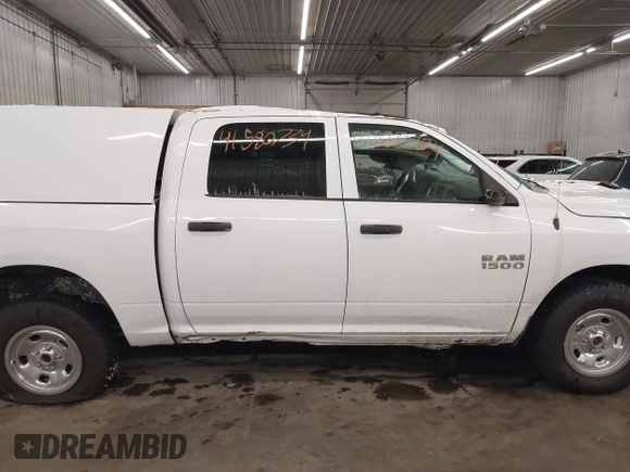 2018 Ram 1500 Express with VIN 1C6RR7KG7JS348228, listed as a IAAI auction lot 41580734 with 96,631 mi miles and . Bid and sale history available at DreamBid. Image 14.