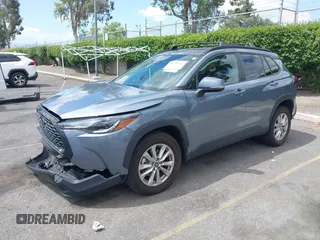 2022 Toyota Corolla Cross LE with VIN 7MUBAAAG1NV004852, listed as a IAAI auction lot 42251301 with 50,197 mi miles and . Bid and sale history available at DreamBid. Image 18.