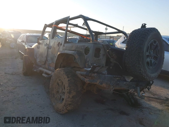 2014 Jeep Wrangler Unlimited Rubicon with VIN 1C4HJWFG8EL159345, listed as a IAAI auction lot 41846272 with Not provided miles and . Bid and sale history available at DreamBid. Image 3.