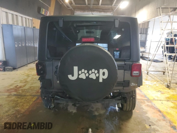2017 Jeep Wrangler Willys Wheeler with VIN 1C4AJWAG3HL751703, listed as a Copart auction lot 88861635 with 14,114 mi miles and Salvage Title. Bid and sale history available at DreamBid. Image 6.