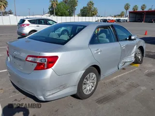 2014 Toyota Camry L with VIN 4T4BF1FK5ER442960, listed as a IAAI auction lot 42206639 with 119,639 mi miles and . Bid and sale history available at DreamBid. Image 4.