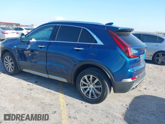 2019 Cadillac XT4 FWD Premium Luxury с VIN 1GYFZCR47KF128284, выставлен на аукционе IAAI как лот 42123219 с пробегом 36 328 миль миль и . История ставок и продаж доступна на DreamBid. Изображение 3.