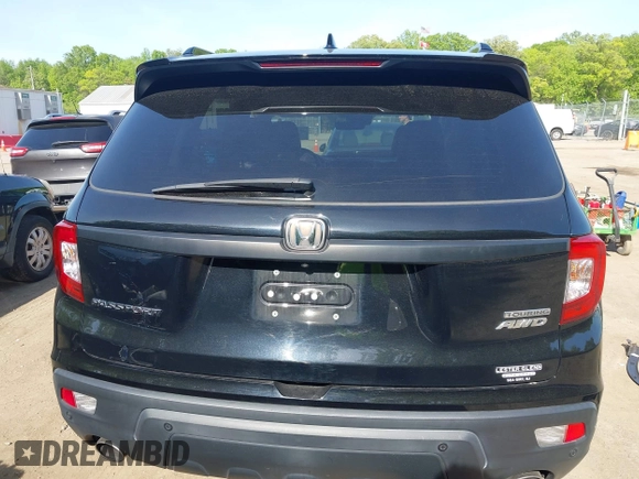 2021 Honda Passport Touring z VIN 5FNYF8H96MB014947, wystawiony jako IAAI lot #42150399 z przebiegiem 47 499 mil mil oraz . Historia ofert i sprzedaży dostępna na DreamBid. Obrazek 16.