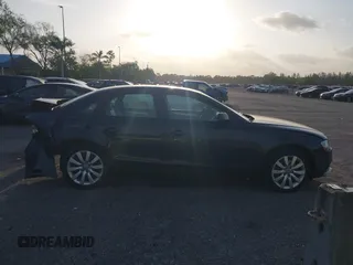 2014 Audi A4 Premium z VIN WAUDFAFL4EN029564, wystawiony jako IAAI lot #41907949 z przebiegiem 111 740 mil mil oraz . Historia ofert i sprzedaży dostępna na DreamBid. Obrazek 13.