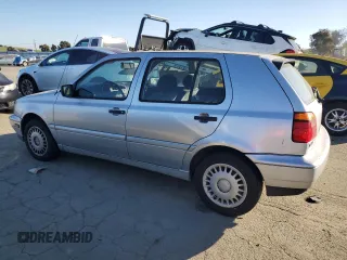 1998 Volkswagen Golf z VIN 3VWFA81H8WM251233, wystawiony jako Copart lot #42441795 z przebiegiem 122 969 mil mil oraz Czysty tytuł • Clean title. Historia ofert i sprzedaży dostępna na DreamBid. Obrazek 2.