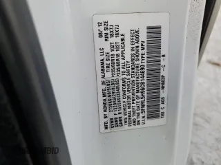 2012 Honda Odyssey Touring with VIN 5FNRL5H96CB144690, listed as a Copart auction lot 75176494 with 0 mi miles and Salvage Title. Bid and sale history available at carsss.com. Image 14.