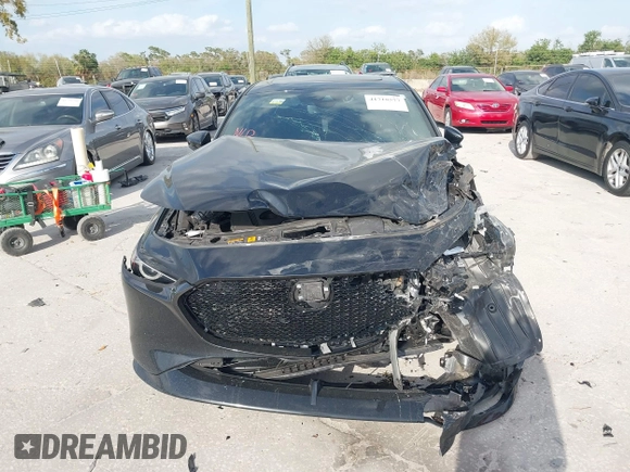 2023 Mazda 3 Premium Plus z VIN JM1BPBNY0P1615814, wystawiony jako IAAI lot #41718577 z przebiegiem Nie podano mil oraz . Historia ofert i sprzedaży dostępna na DreamBid. Obrazek 12.