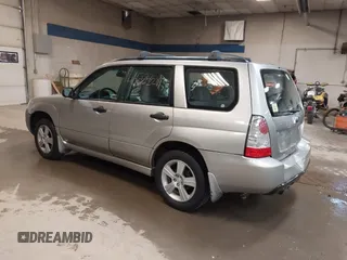 2006 Subaru Forester 2.5 X with VIN JF1SG636X6H712880, listed as a IAAI auction lot 40062211 with 127,537 mi miles. Bid and sale history available at carsss.com. Image 3.