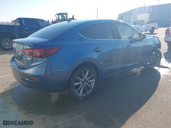 2018 Mazda Mazda3 4-Door Grand Touring with VIN 3MZBN1W38JM179689, listed as a IAAI auction lot 41305303 with 77,277 mi miles. Bid and sale history available at carsss.com. Image 4.