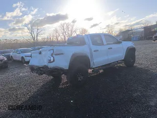 2023 Chevrolet Colorado 4WD Trail Boss with VIN 1GCPTEEK7P1181101, listed as a Copart auction lot 48180015 with 23,423 mi miles and Salvage Title. Bid and sale history available at carsss.com. Image 4.