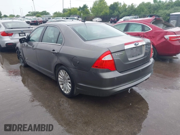 2010 Ford Fusion Hybrid with VIN 3FADP0L37AR242651, listed as a IAAI auction lot 42457758 with 196,894 mi miles and . Bid and sale history available at DreamBid. Image 3.