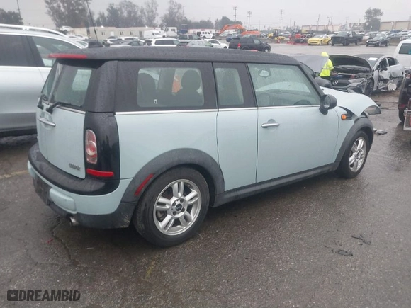 2013 MINI Cooper Clubman with VIN WMWZF3C56DT491108, listed as a IAAI auction lot 41734006 with 100,086 mi miles. Bid and sale history available at carsss.com. Image 4.