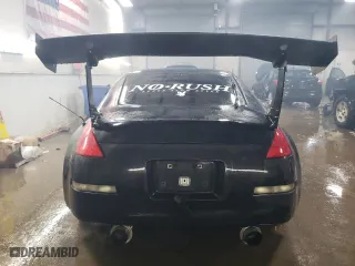2003 Nissan 350Z Touring with VIN JN1AZ34E03T015010, listed as a Copart auction lot 45957055 with 118671 miles and Salvage Title. Bid and sale history available at carsss.com. Image 6.