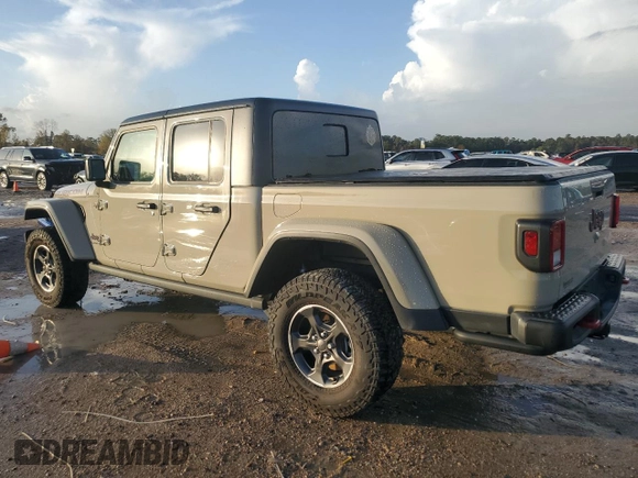2022 Jeep Gladiator Rubicon z VIN 1C6JJTBG3NL174980, wystawiony jako Copart lot #85774884 z przebiegiem Nie podano mil oraz Nie do naprawy • Non repairable. Historia ofert i sprzedaży dostępna na DreamBid. Obrazek 2.