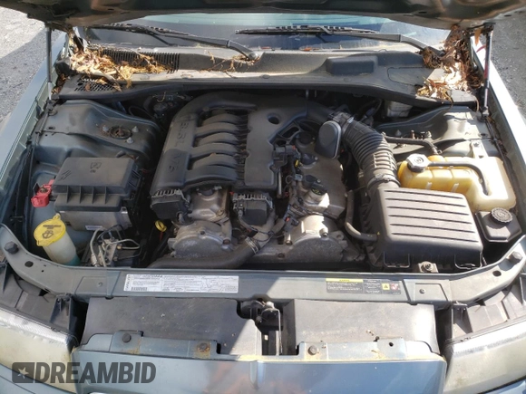 2006 Chrysler 300 Touring z VIN 2C3KA53G66H405462, wystawiony jako Copart lot #55913485 z przebiegiem 138 369 mil mil oraz Szkoda całkowita • Salvage title. Historia ofert i sprzedaży dostępna na DreamBid. Obrazek 11.