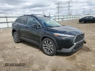 2024 Toyota Corolla Cross XLE z VIN 7MUDAABG9RV102170, wystawiony jako Copart lot #53101075 z przebiegiem 1 709 mil mil oraz Szkoda całkowita • Salvage title. Historia ofert i sprzedaży dostępna na DreamBid. Obrazek 4.