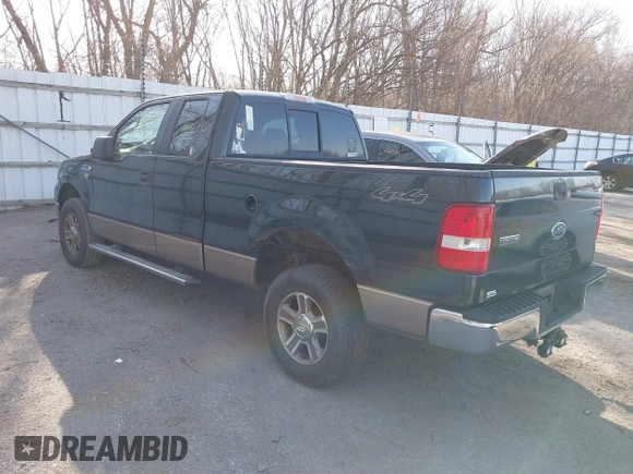 2005 Ford F-150 XLT with VIN 1FTPX14505FB72622, listed as a IAAI auction lot 41823532 with 165,918 mi miles. Bid and sale history available at carsss.com. Image 3.