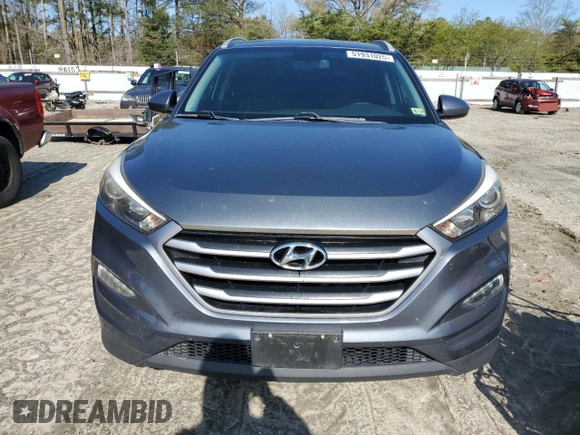 2017 Hyundai Tucson SE with VIN KM8J33A49HU485334, listed as a Copart auction lot 51931025 with 103,907 mi miles and Salvage Title. Bid and sale history available at DreamBid. Image 5.
