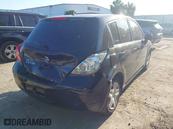 2012 Nissan Versa S with VIN 3N1BC1CP8CK201207, listed as a IAAI auction lot 42064101 with 206,514 mi miles. Bid and sale history available at carsss.com. Image 4.