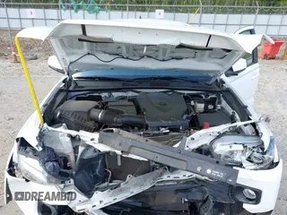 2017 Toyota Tacoma SR5 z VIN 3TMAZ5CN8HM045727, wystawiony jako IAAI lot #41962213 z przebiegiem 88 042 mil mil oraz . Historia ofert i sprzedaży dostępna na DreamBid. Obrazek 10.