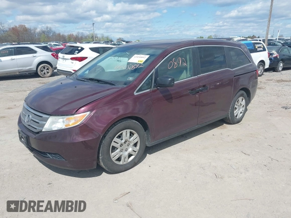 2013 Honda Odyssey LX with VIN 5FNRL5H28DB058401, listed as a IAAI auction lot 42050892 with 221,016 mi miles and . Bid and sale history available at carsss.com. Image 2.