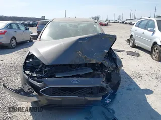 2017 Ford Focus SE с VIN 1FADP3F28HL204391, выставлен на аукционе IAAI как лот 41786975 с пробегом Не указан миль и . История ставок и продаж доступна на DreamBid. Изображение 12.